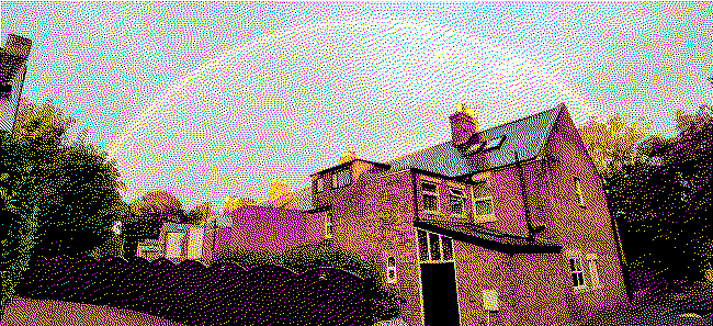 Rainbow over a row of terraced houses