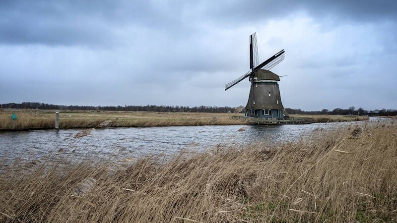 Windmill next to a canal