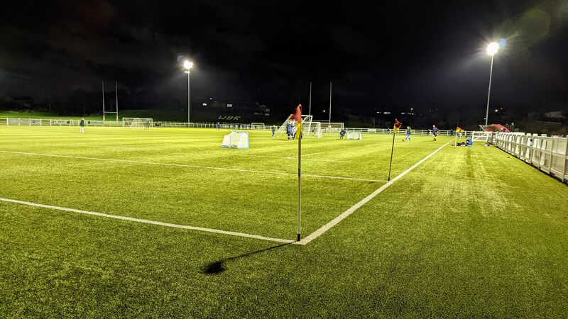 Artificial pitch with corner flag